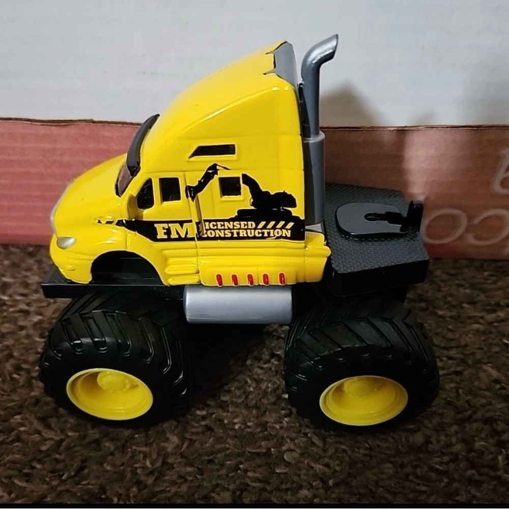 Yellow Construction Monster Truck Toy